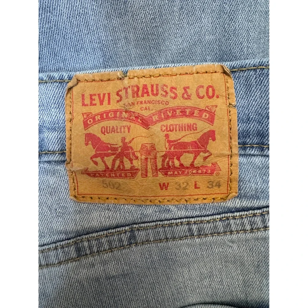 Levis 502 Taper Jeans Men's Light Wash Blue Denim Jeans 32x34 W32 L34